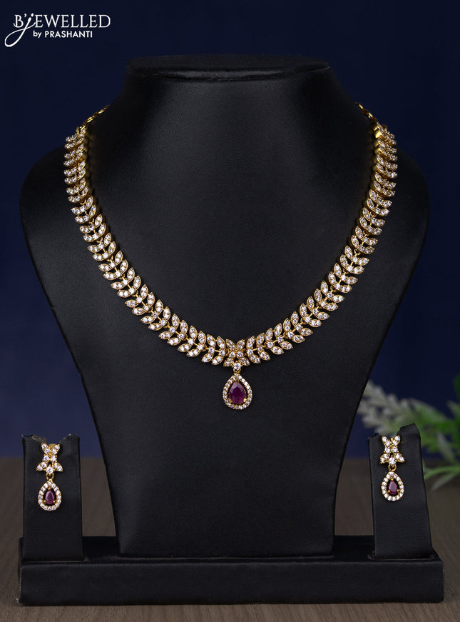 Zircon necklace with ruby and cz stones in gold finish