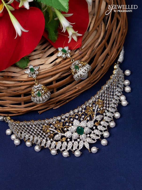 Zircon choker with ruby and cz stone and pearl hangings in gold finish