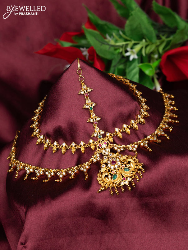 Antique maang tikka peacock design with kemp & cz stones and golden beads hanging
