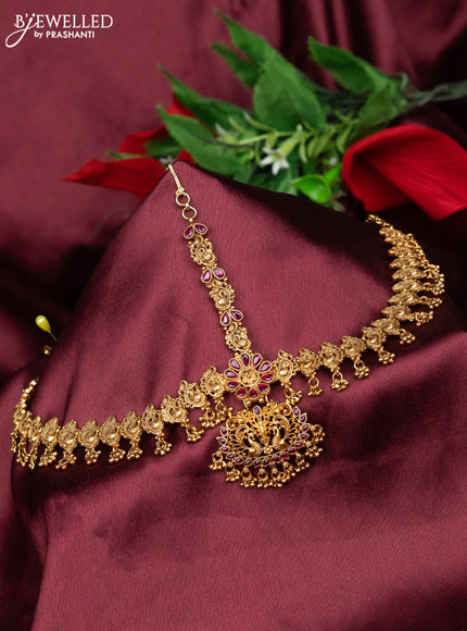 Antique maang tikka peacock design with pink kemp and golden beads hanging