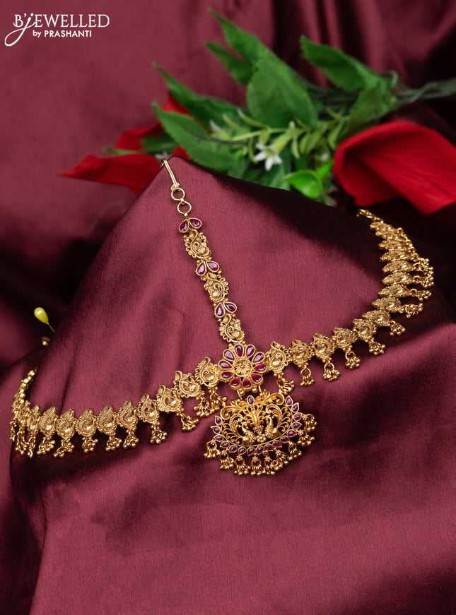 Antique maang tikka peacock design with pink kemp and golden beads hanging