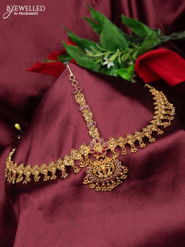 Antique maang tikka peacock design with pink kemp and golden beads hanging