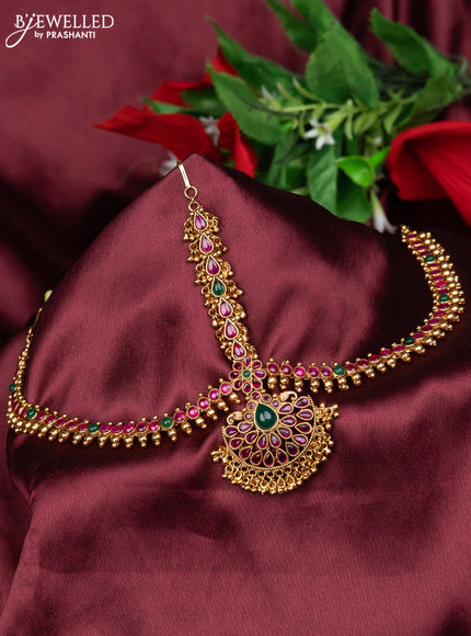 Antique maang tikka with kemp kundan stones and golden beads hanging