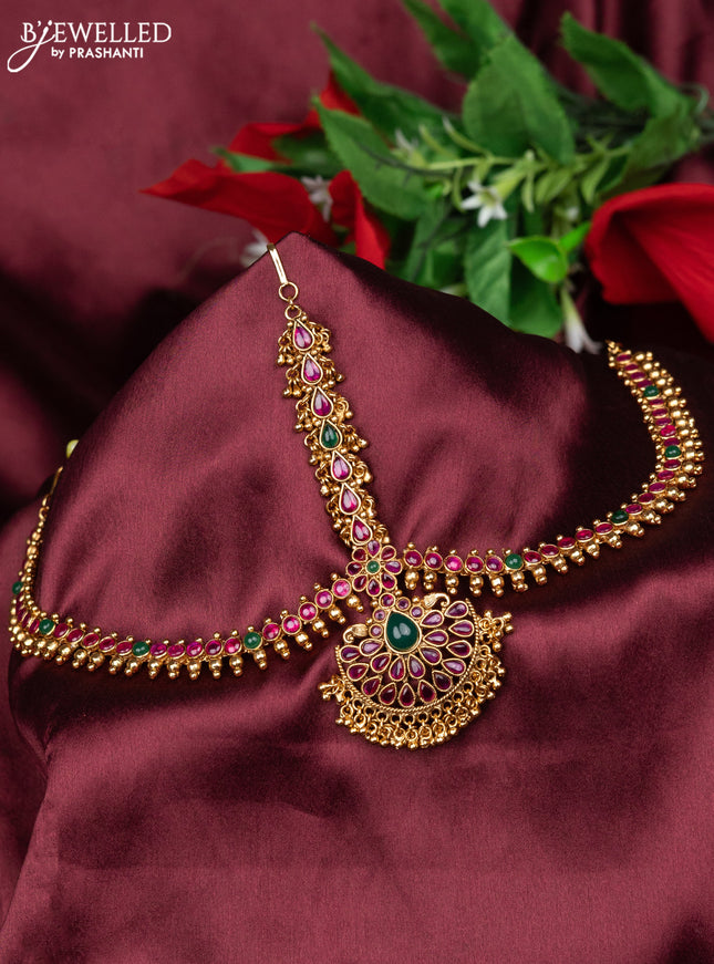 Antique maang tikka with kemp kundan stones and golden beads hanging