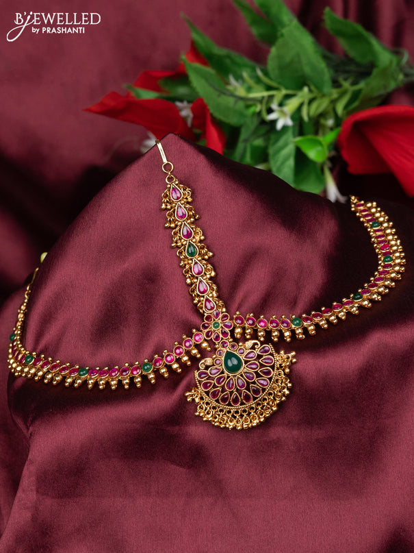 Antique maang tikka with kemp kundan stones and golden beads hanging