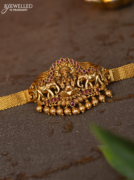 Antique vanki lakshmi design with pink kemp and golden beads hangings