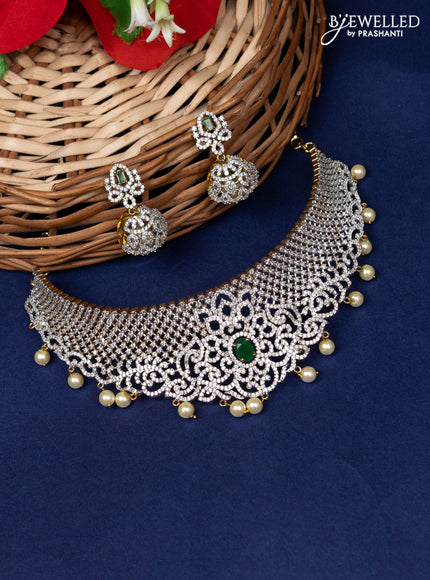 Zircon choker with emerald & cz stone and pearl hangings in gold finish
