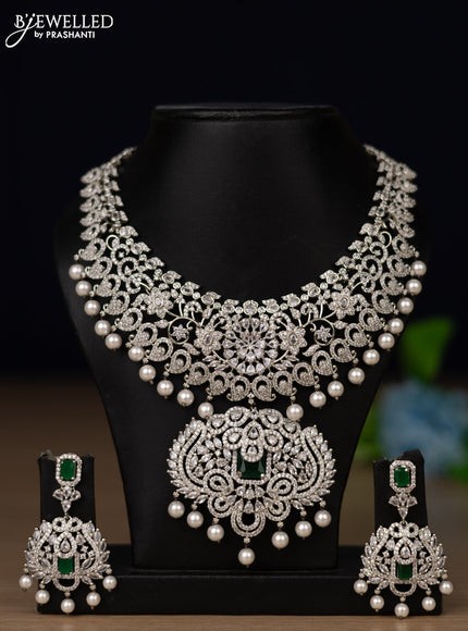 Zircon necklace with emerald & cz stones and pearl hangings