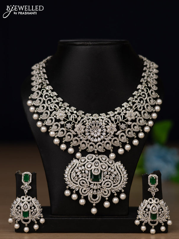 Zircon necklace with emerald & cz stones and pearl hangings