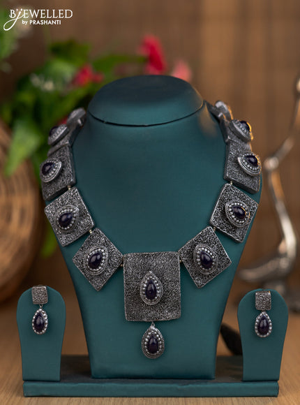 Terracotta grey and black necklace with hangings
