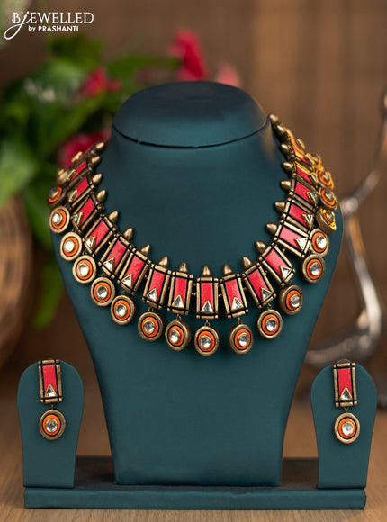 Terracotta pink and orange necklace with hangings