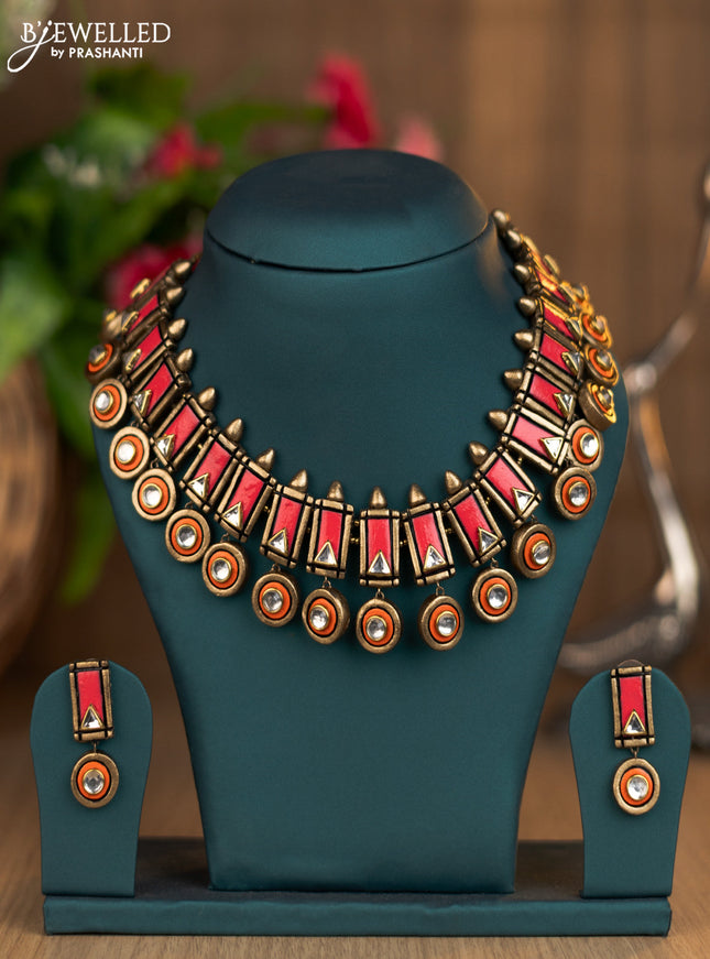 Terracotta pink and orange necklace with hangings