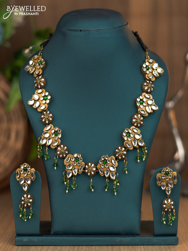 Terracotta emerald & white kundan stone necklace with beads hangings