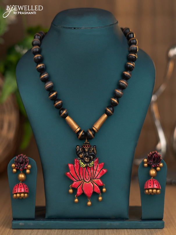 Teracotta necklace with ganesha and lotus pendant