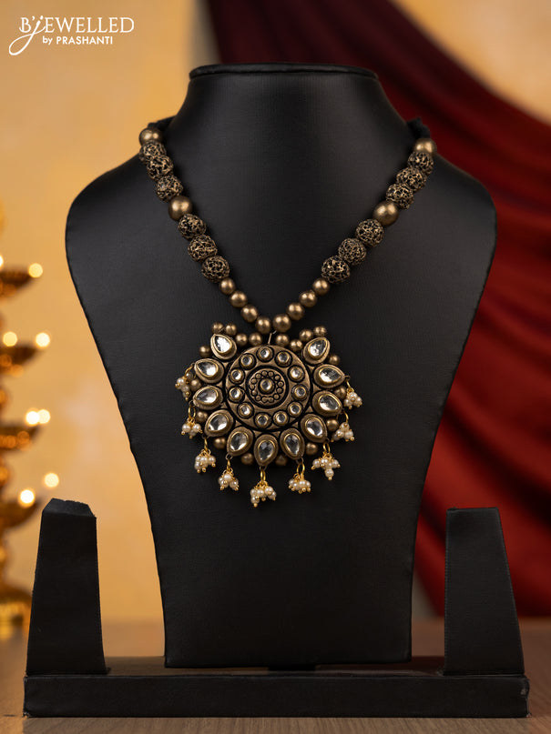 Teracotta rudhraksha design necklace with kundan and pearls hangings without earring