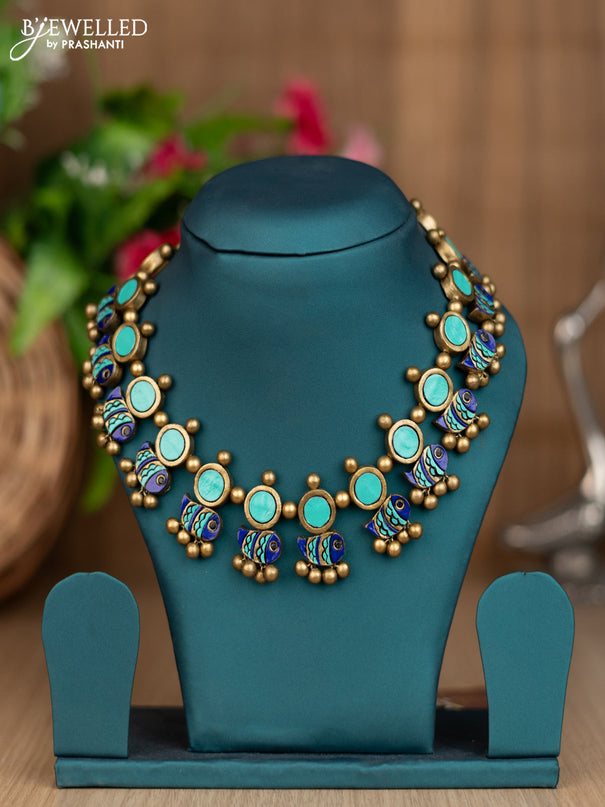 Teracotta necklace with fish design pattern and golden beads hangings without earring