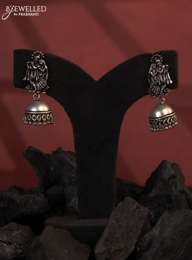 Oxidised jhumkas with radha krishna design and silver beads hanging