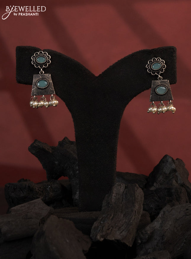 Oxidised earrings with mint green stones and pearl hangings