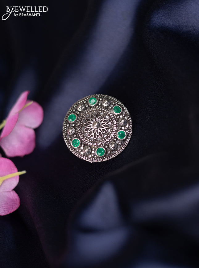 Oxidised ring with emerald stones