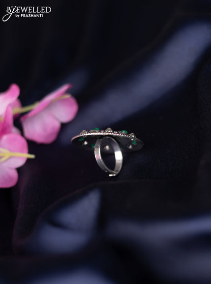 Oxidised ring with emerald stones