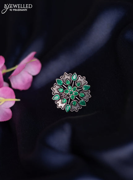 Oxidised ring with emerald stones