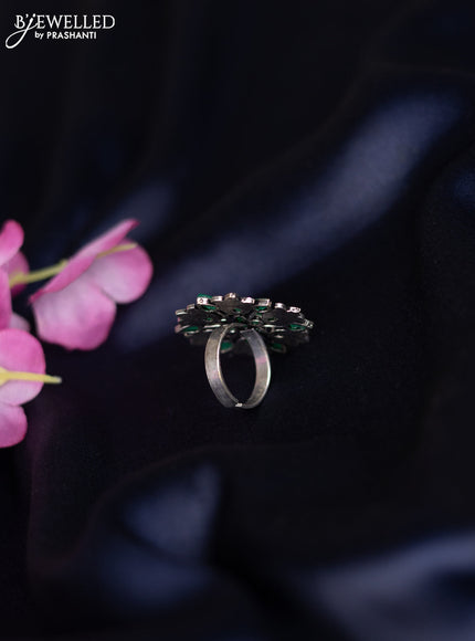 Oxidised ring with emerald stones