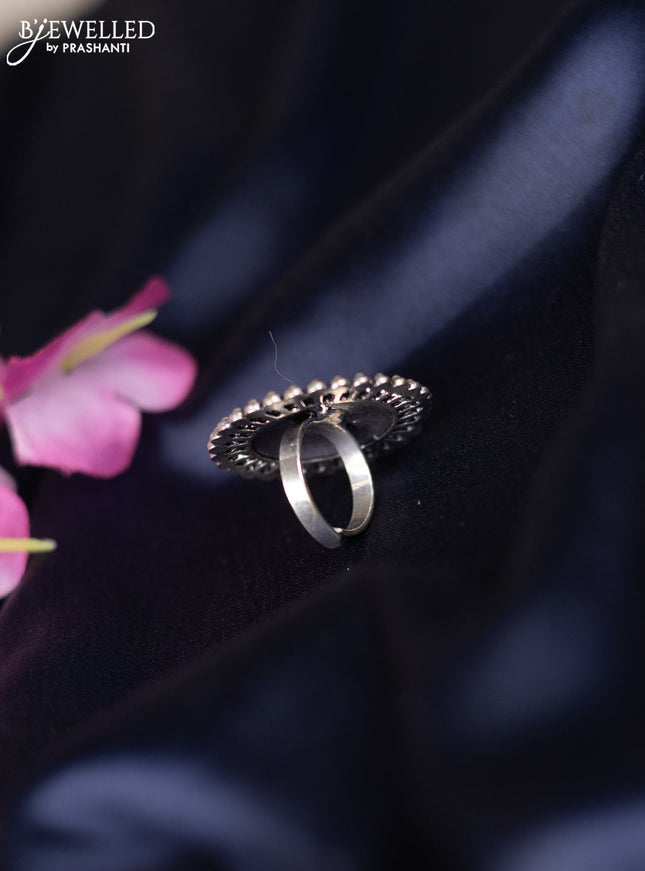 Oxidised ring with black stones