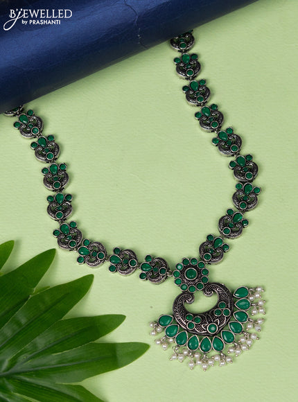 Oxidised haaram with emerald stones and pearl hangings without earring