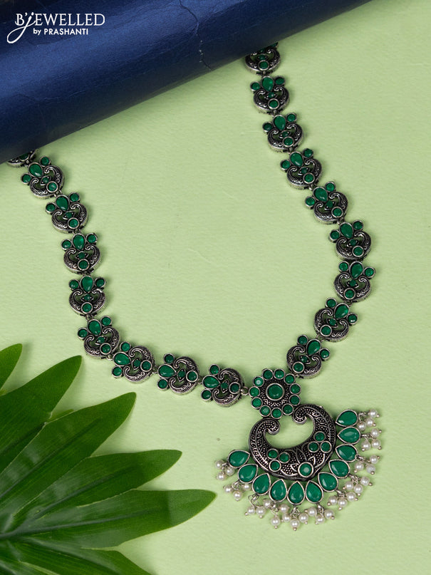 Oxidised haaram with emerald stones and pearl hangings without earring