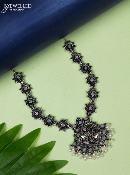 Oxidised necklace floral design with baby pink & mint green stones and pearl hangings without earring