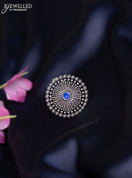 Oxidised ring with emerald stones