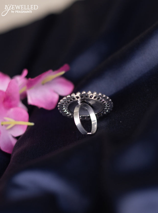 Oxidised ring with emerald stones