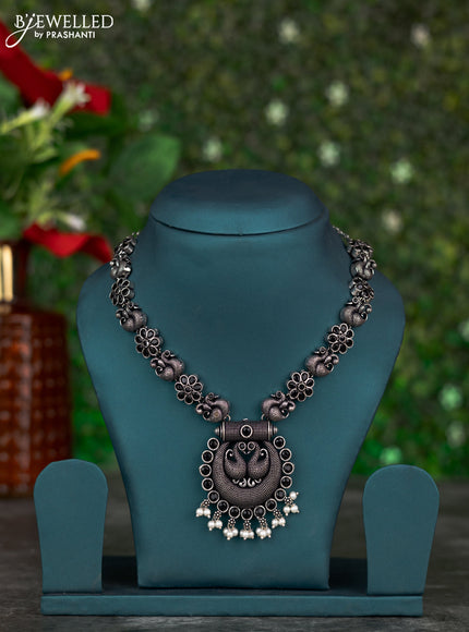 Oxidised necklace swan design with black stones and pearl hangings without earring