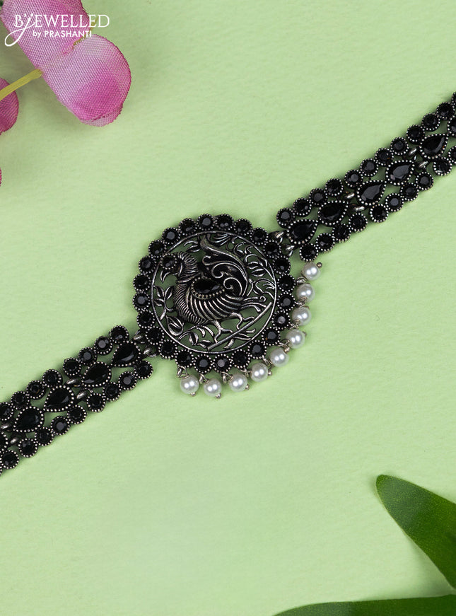 Oxidised choker peacock design with black stone and pearl hangings without earring
