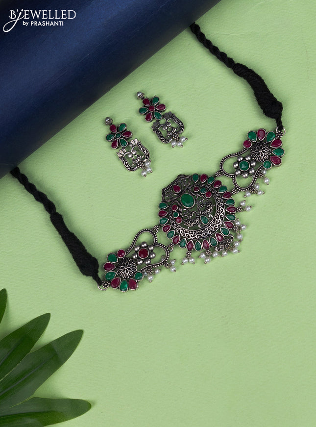 Oxidised choker peacock design with kemp stone and pearl hangings