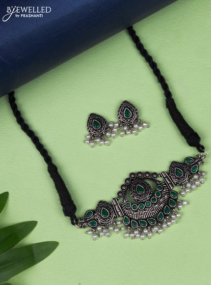 Oxidised choker with emerald stone and pearl hangings