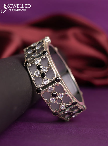 Oxidised screw type bangle with black and cz stones