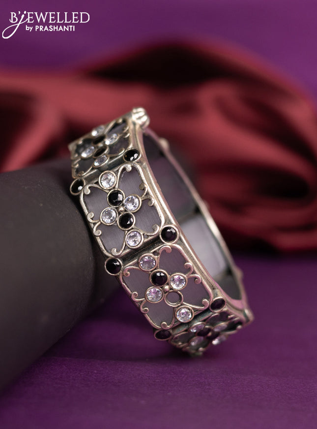 Oxidised screw type bangle with black and cz stones