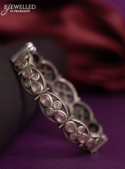 Oxidised screw type bangles with baby pink stone