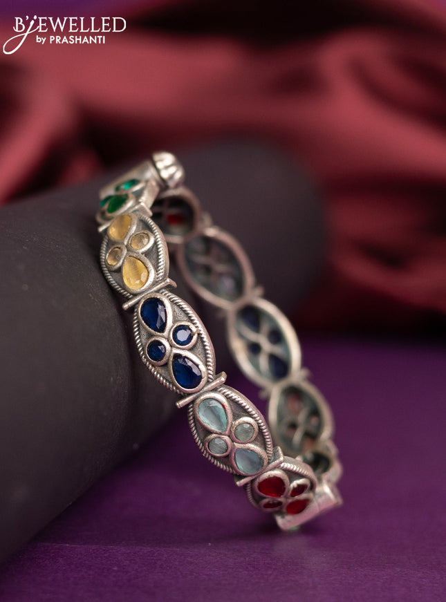 Oxidised screw type bangle with multicolour stones