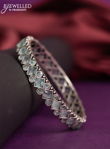 Oxidised bangle with mint green stones