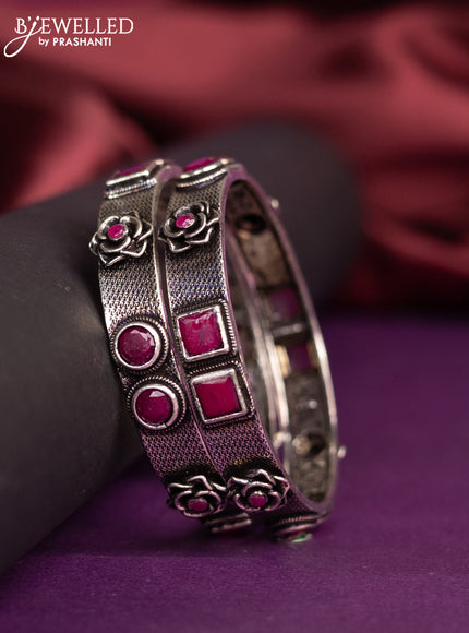 Oxidised floral design bangles with ruby stone