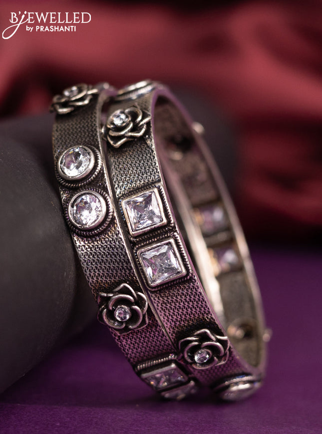 Oxidised floral design bangles with cz stone