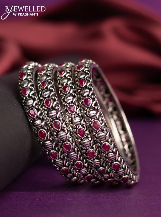 Oxidised bangle with pink kemp stones