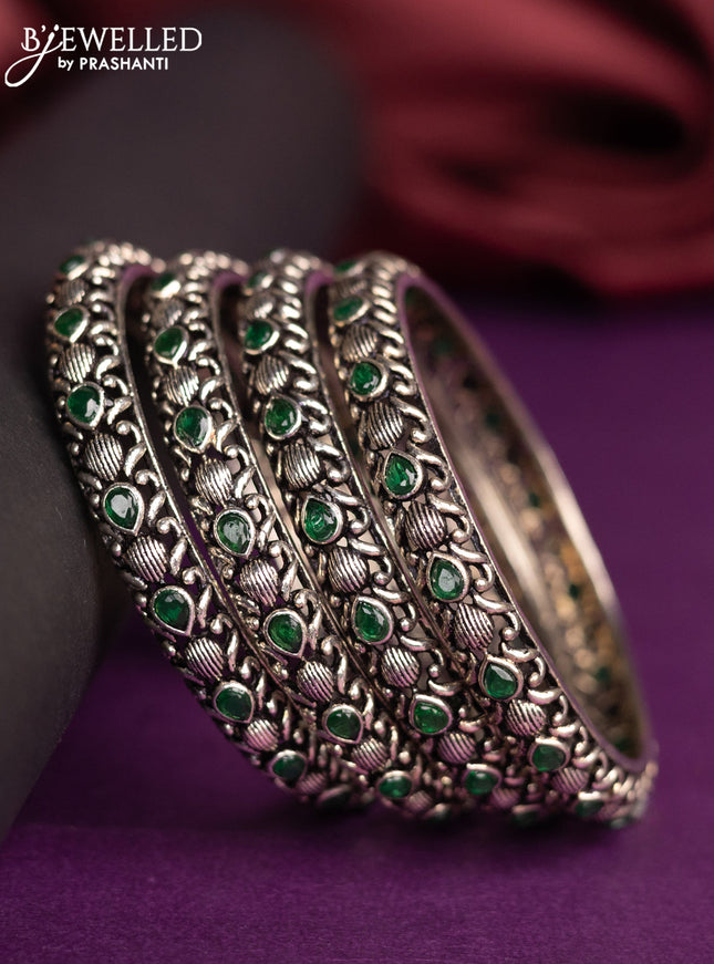 Oxidised bangle with emerald stones