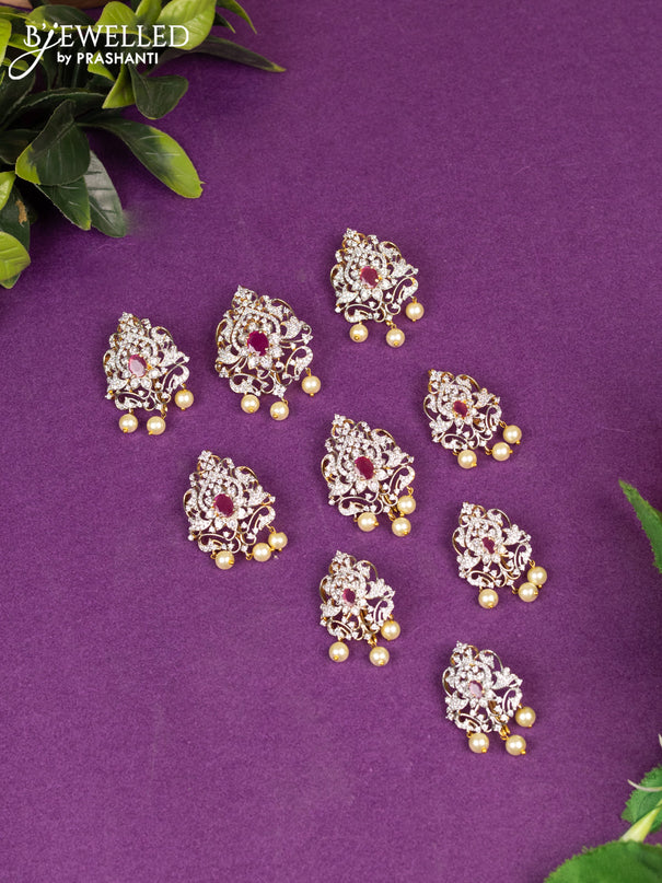 Zircon jada billai with ruby & cz stone and pearl hangings in gold finish