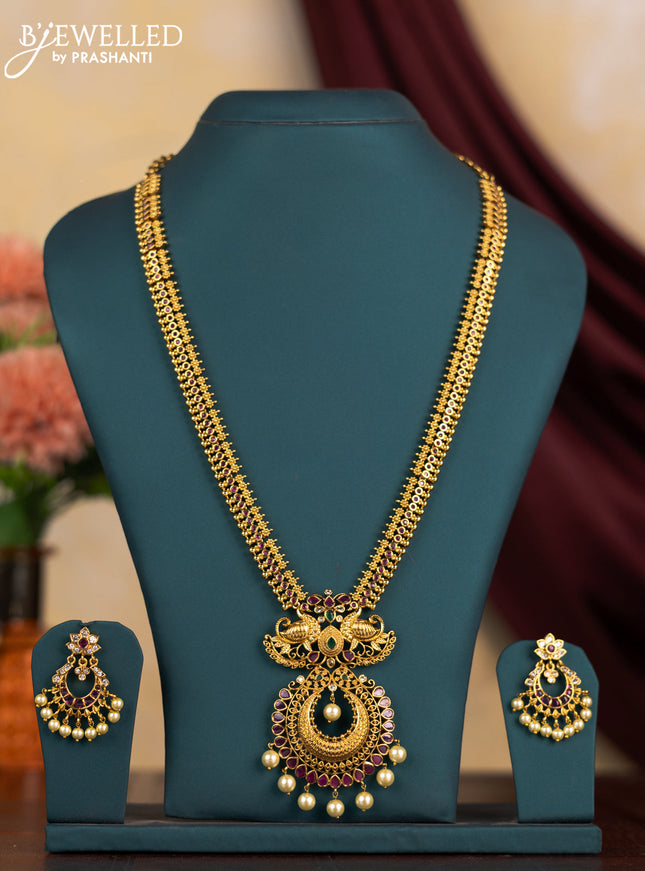 Antique haram peacock design with kemp & cz stones and pearl hangings