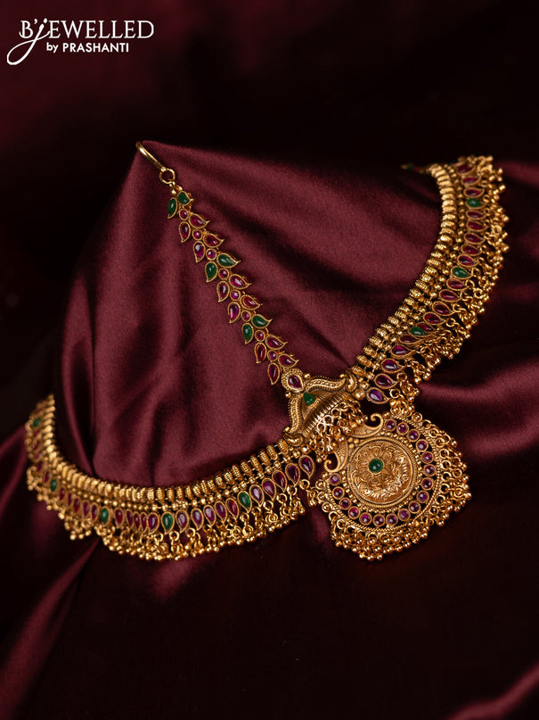 Antique maang tikka with kemp stones and golden beads hangings