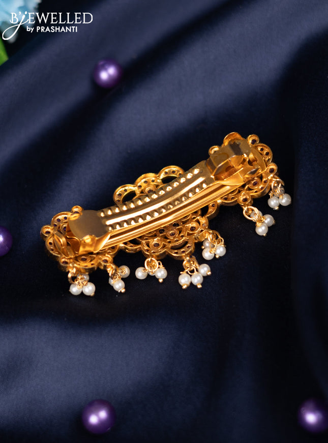 Antique antique medium size hair clips with kemp stones and pearl hangings