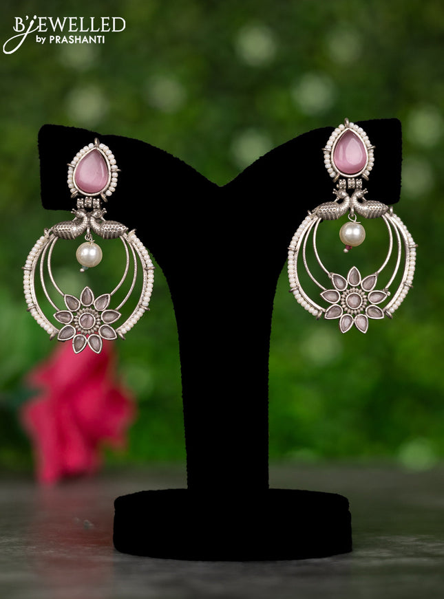 Oxidised earrings peacock design with baby pink stones and pearl hangings